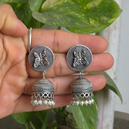 Naari Jewels Oxidized German Silver Butterfly Disc Jhumka Brass Earrings with Pearl Drops for Women