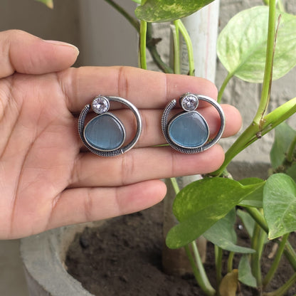 Naari Jewels Celeste Loop Oxidised Stud Earrings | Blue Stone Halo Design | Elegant German Silver Jewellery