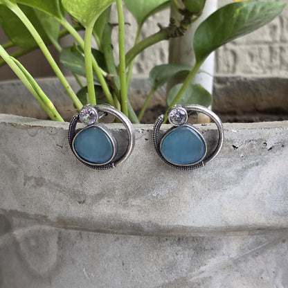 Naari Jewels Celeste Loop Oxidised Stud Earrings | Blue Stone Halo Design | Elegant German Silver Jewellery