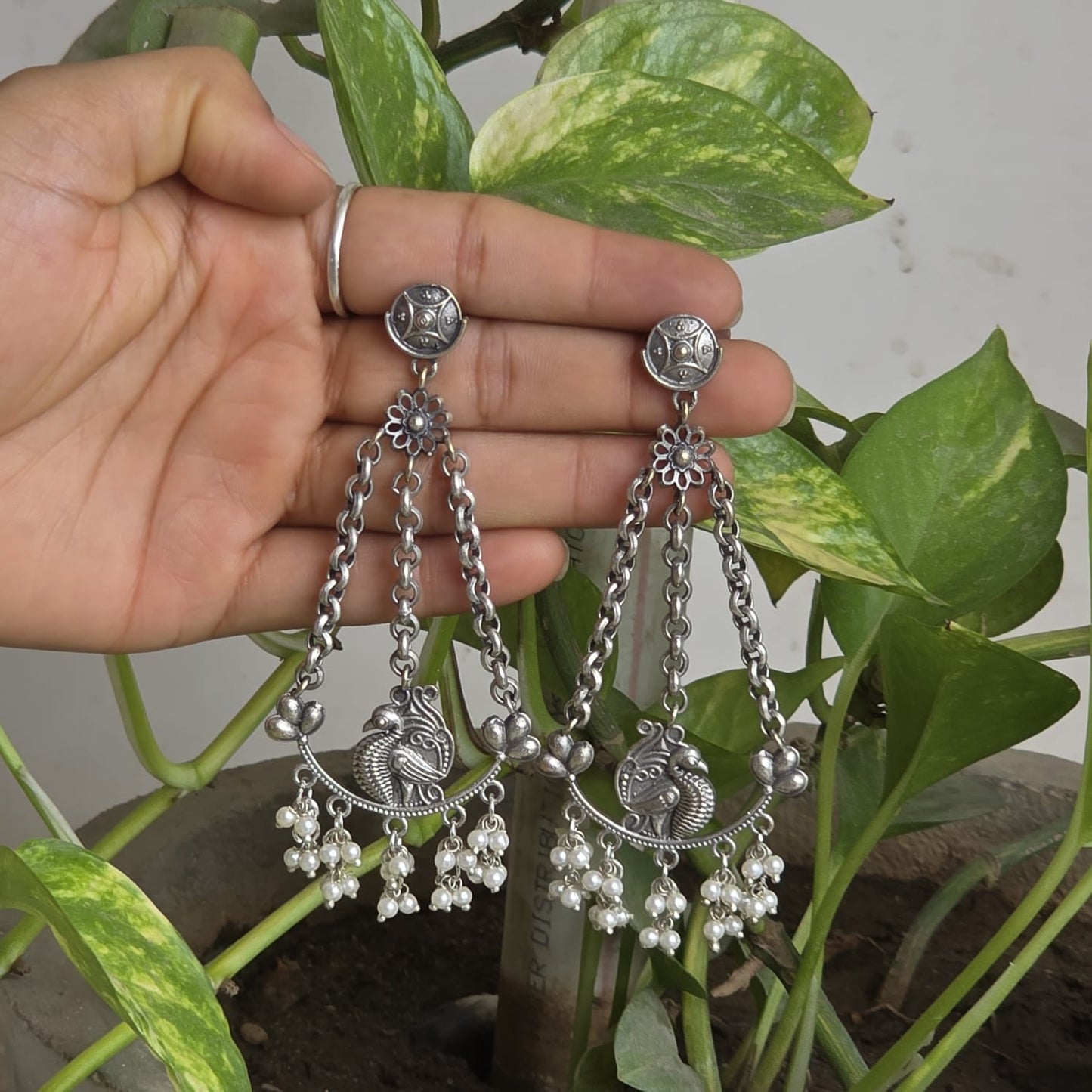 Naari Jewels Oxidized German Silver Triveni Mor Pearl Chandbali Chain Earrings
