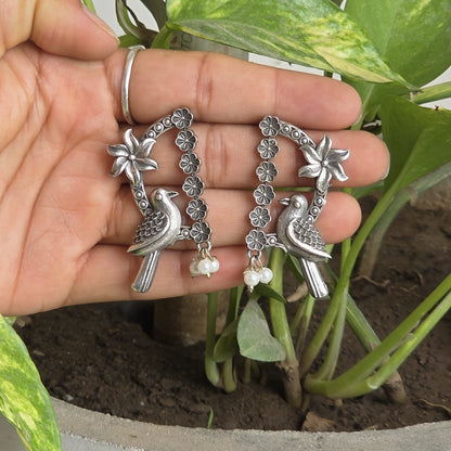 Naari Jewels Oxidized German Silver Nisarga Bird Arch Earrings