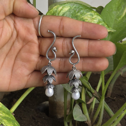 Naari Jewels Oxidized German Silver Peacock Floral 3-Layer Jhumka with Pearl Drops Earring