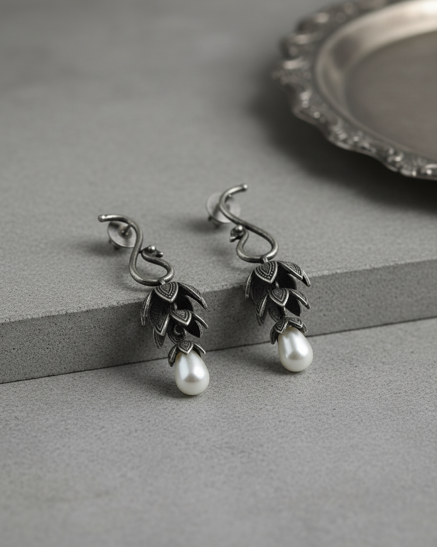 Naari Jewels Oxidized German Silver Peacock Floral 3-Layer Jhumka with Pearl Drops Earring