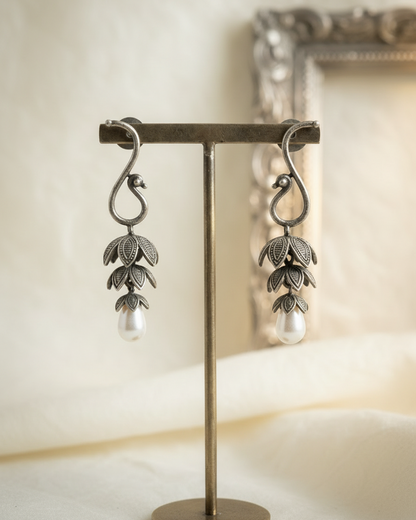 Naari Jewels Oxidized German Silver Peacock Floral 3-Layer Jhumka with Pearl Drops Earring