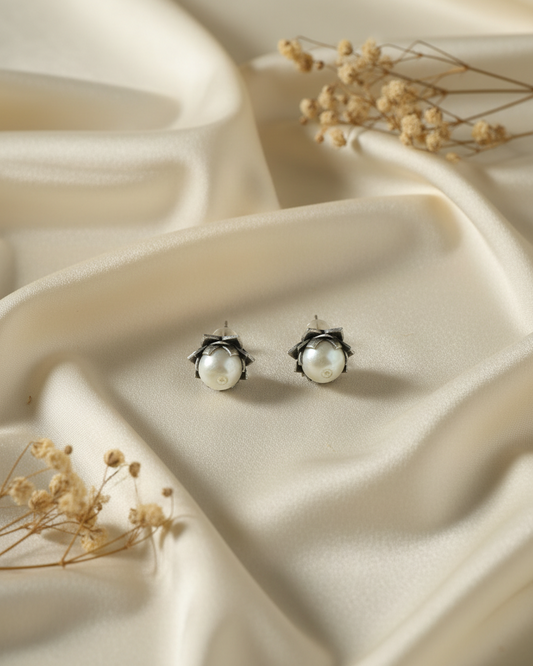 Naari Jewels Oxidized German Silver Classic Charm Pearl Studs Earrings