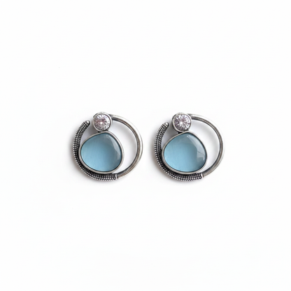 Naari Jewels Celeste Loop Oxidised Stud Earrings | Blue Stone Halo Design | Elegant German Silver Jewellery