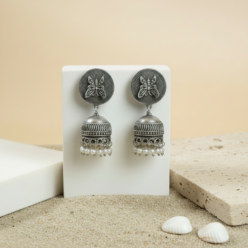 Naari Jewels Oxidized German Silver Butterfly Disc Jhumka Brass Earrings with Pearl Drops for Women