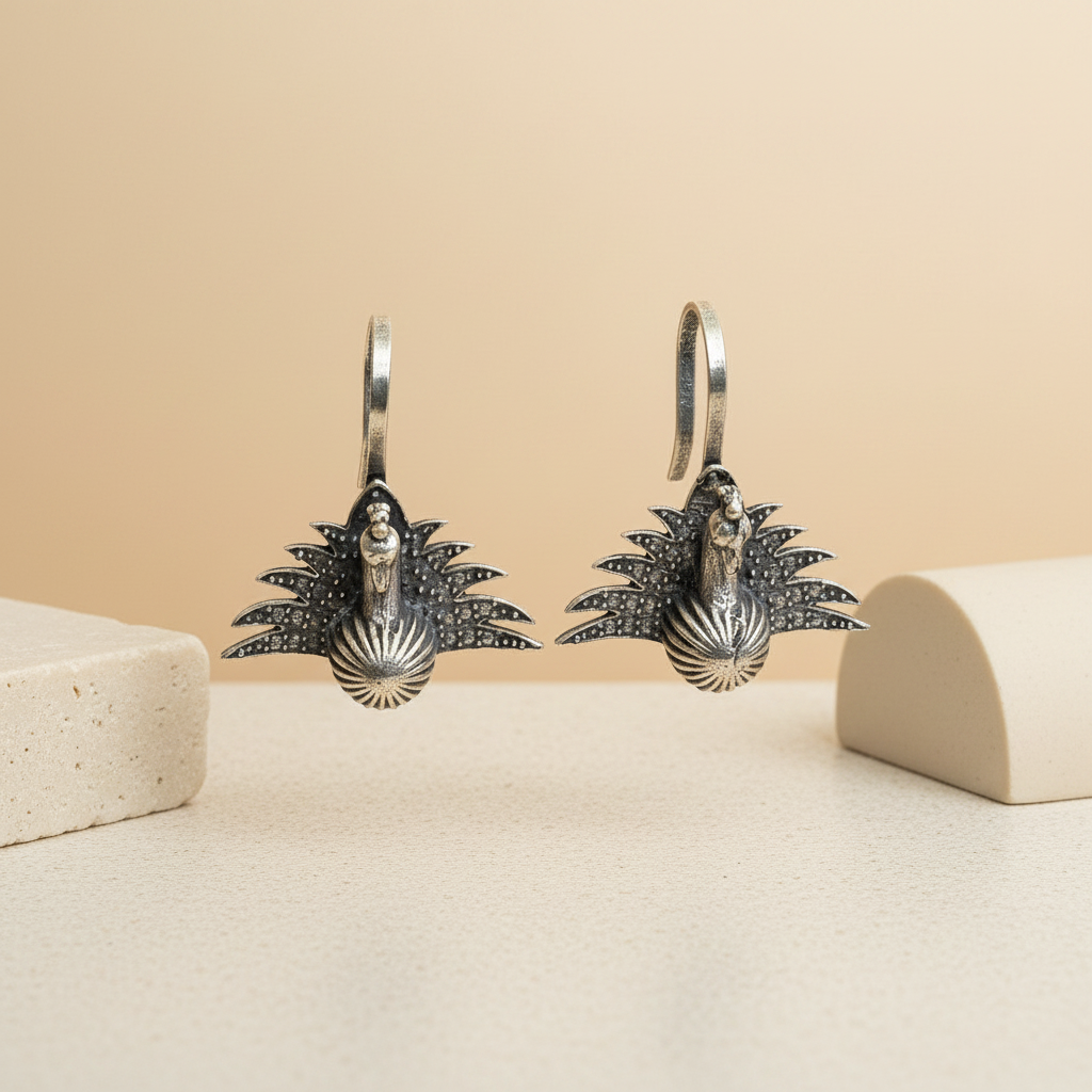 Naari Jewels Oxidized German Silver Peacock Bugadi Earrings for Women | Traditional Ear Cuff Style | Antique Brass Jewellery